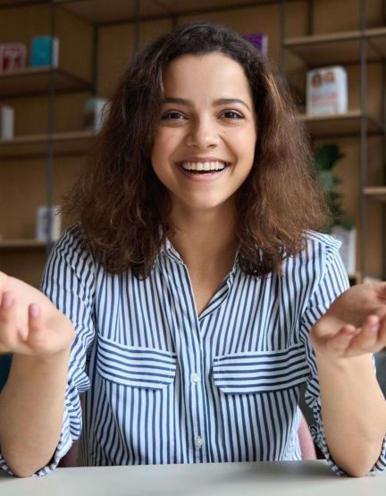 happy-latin-young-woman-online-teacher-or-student-T52LK2F.jpg